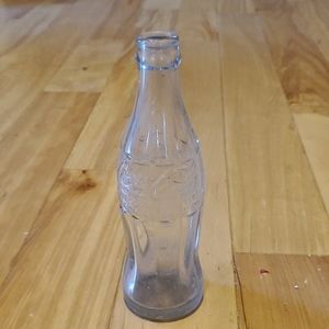 Antique embossed Coca-Cola bottle